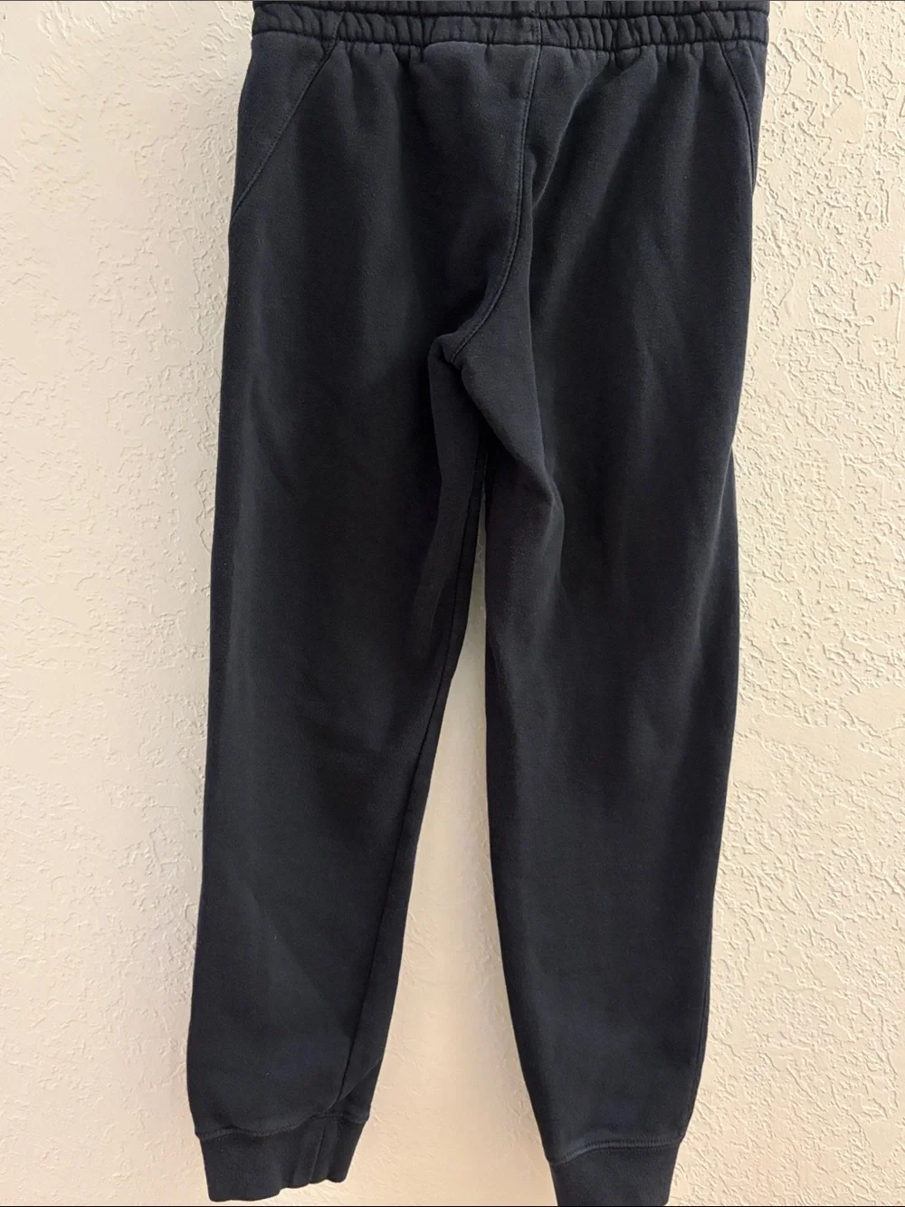 Nike Kids Black Sweatpants with White Swoosh